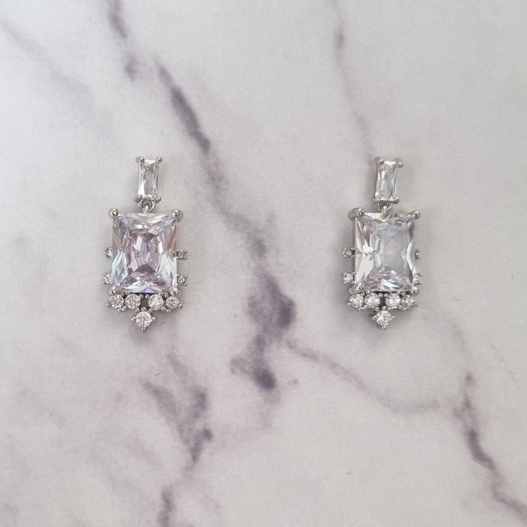 AP370 Aretes Plateados Baguette y Circ Mini
