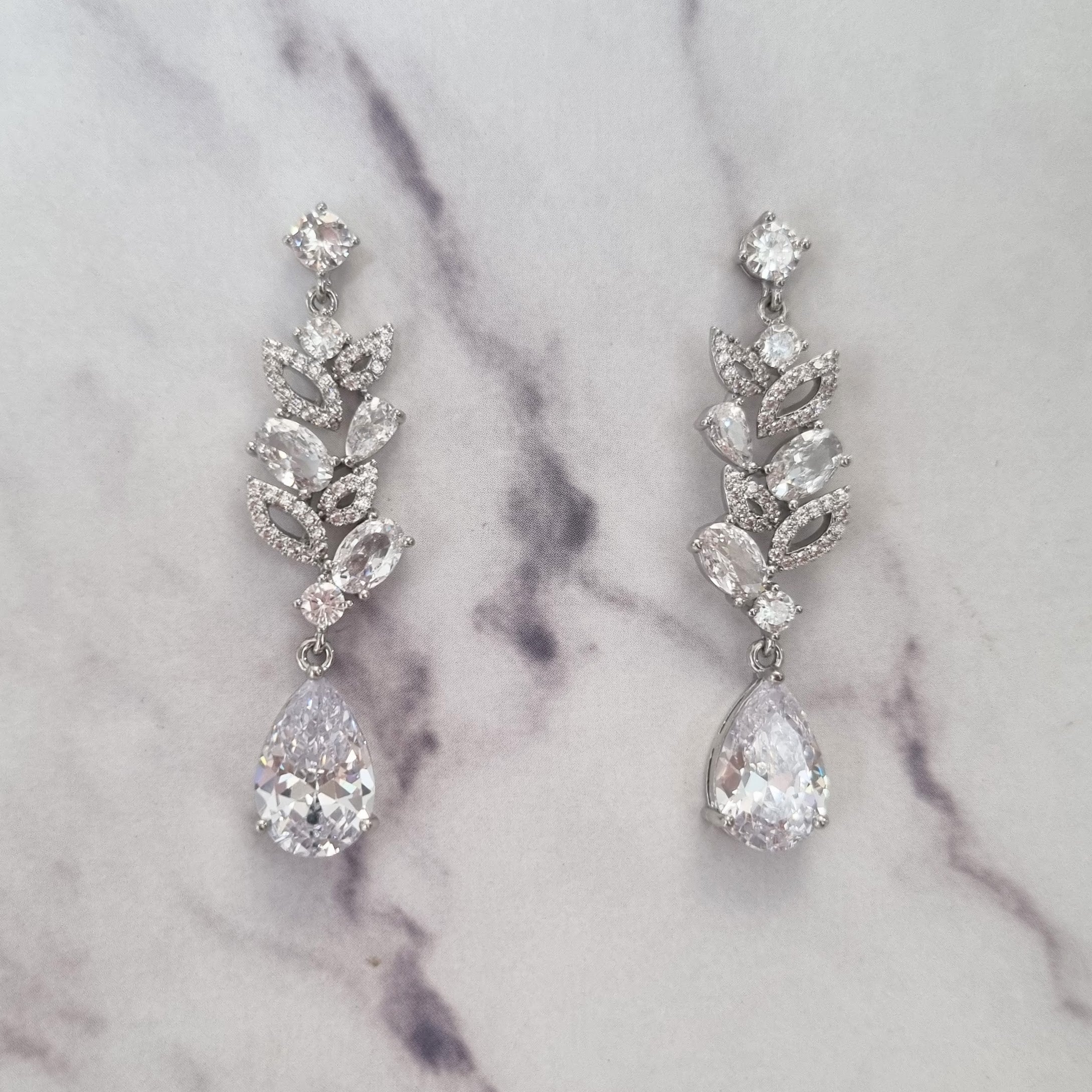 AP269 Aretes Plateados Hojas con Gota