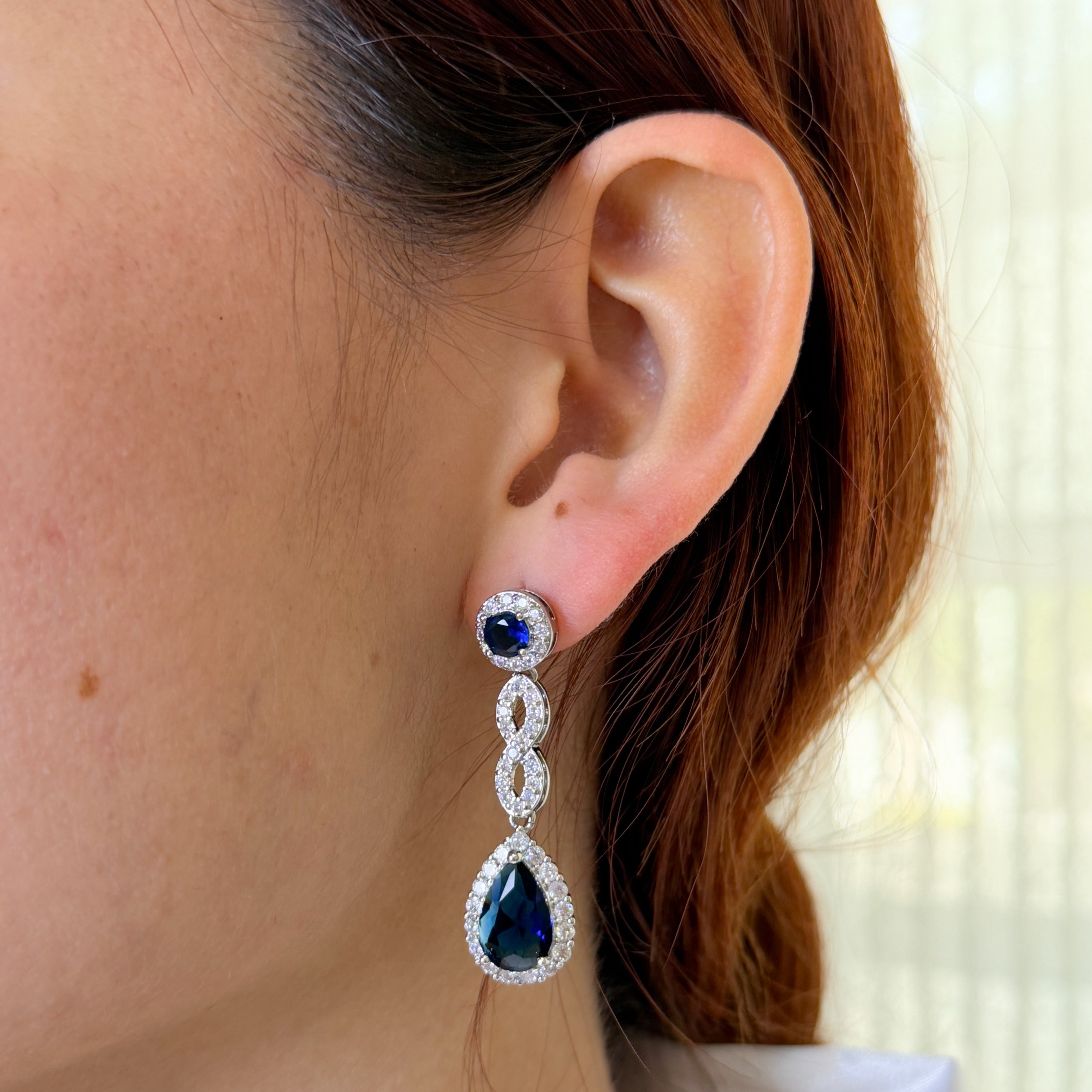 AP978 ARETES PLATEADOS INFINITO Y GOTA AZUL