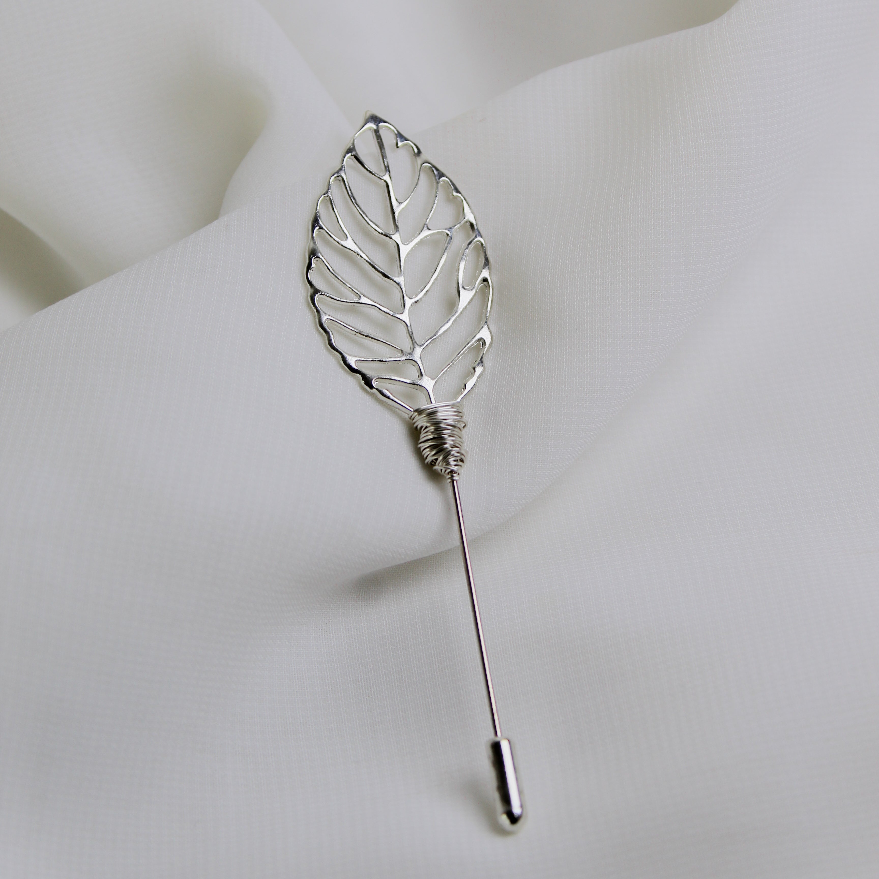 BP734 BOUTTONIERE HOJA