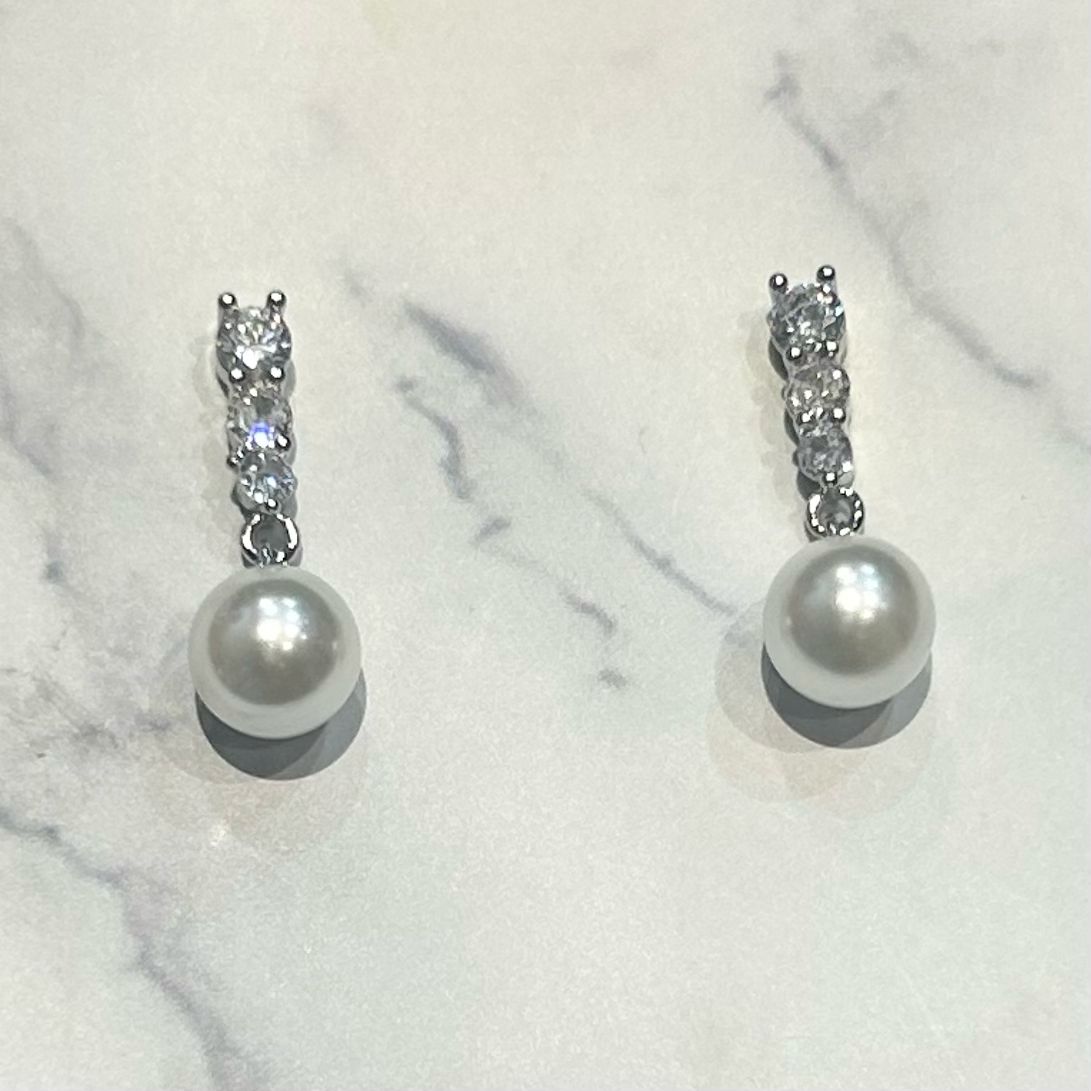 AP519 Aretes Plateados Pal Crist y Perla mini