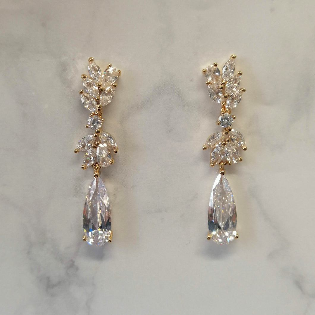 AD553 ARETES DORADOS DOBLE STUD GOTA DLG