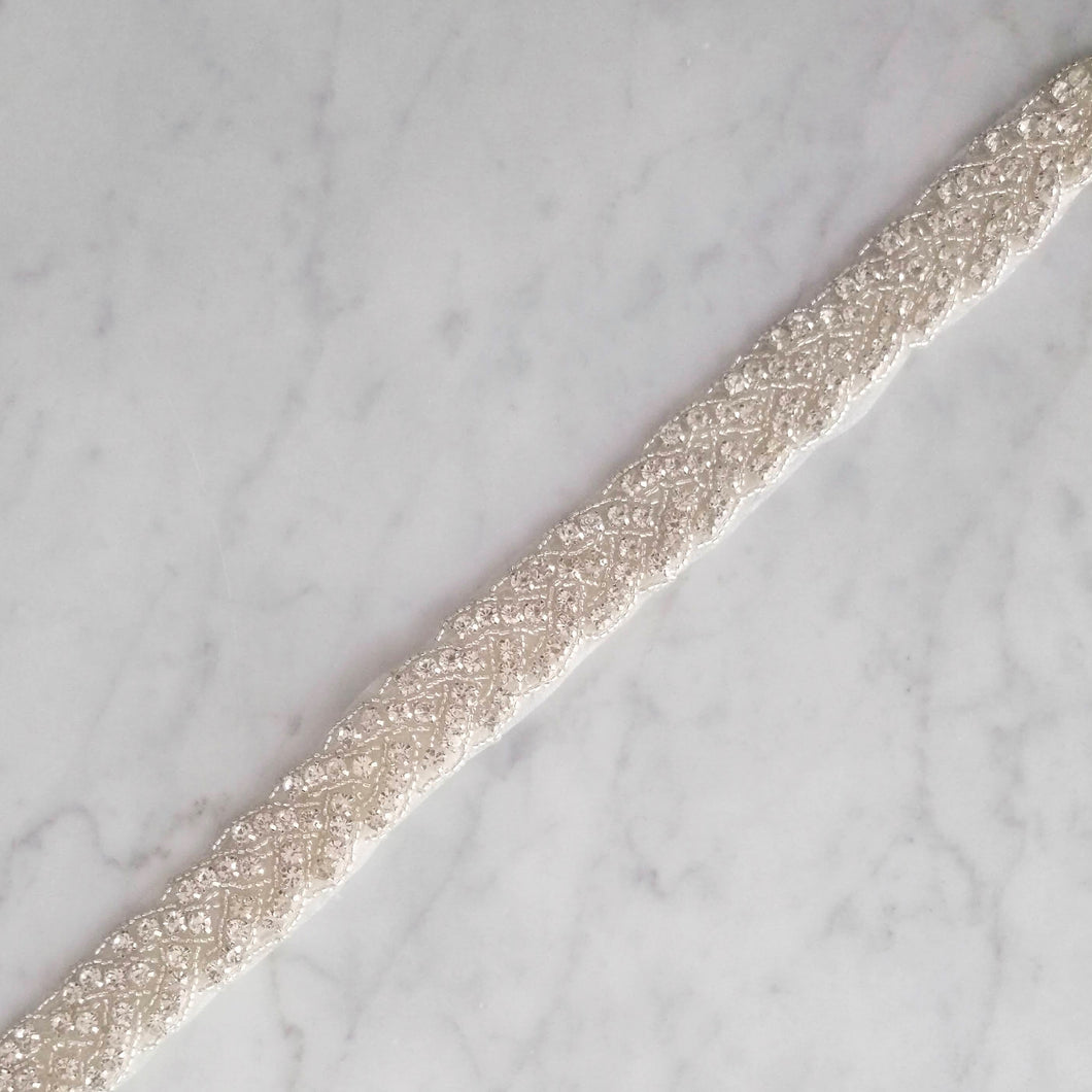 CPI357 CINTO PLATEADO IVORY TRENZADO
