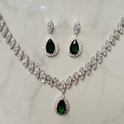 SP712 JUEGO PLATA GOTA CON CRIST VERDE PORP