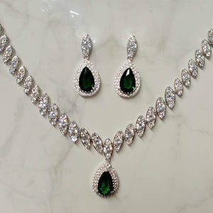 SP712 JUEGO PLATA GOTA CON CRIST VERDE PORP