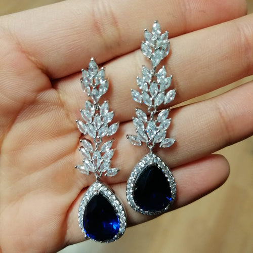 AP547 ARETES LARGOS MARQ CON GOTA AZUL