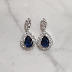 AP628 ARETES PLATEADOS CON GOTA AZUL GDE