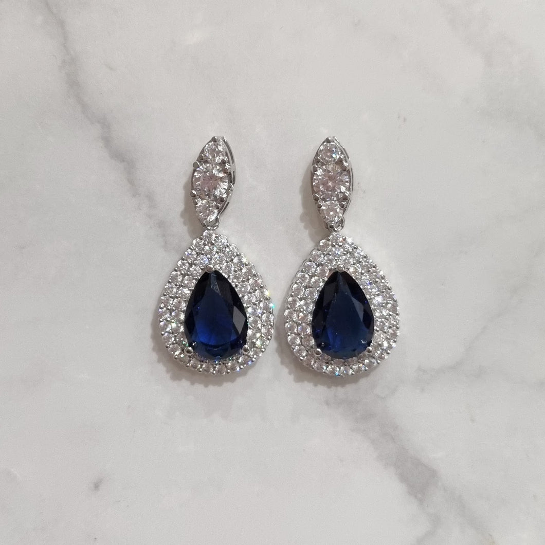 AP628 ARETES PLATEADOS CON GOTA AZUL GDE