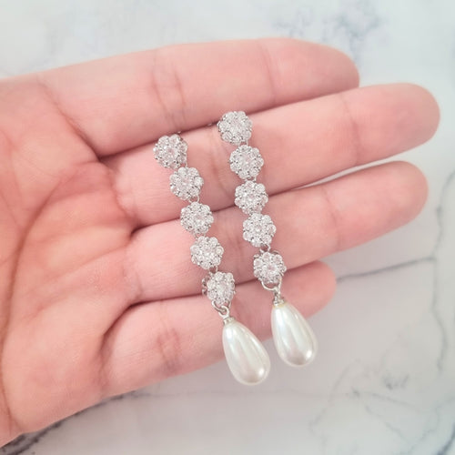 AP107 ARETES PLATEADOS 5 CIRC Y PERLA