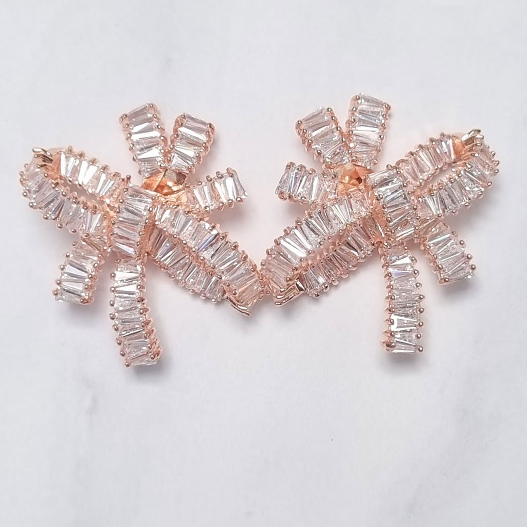 AR104 ARETES DE MOÑO ROSAS