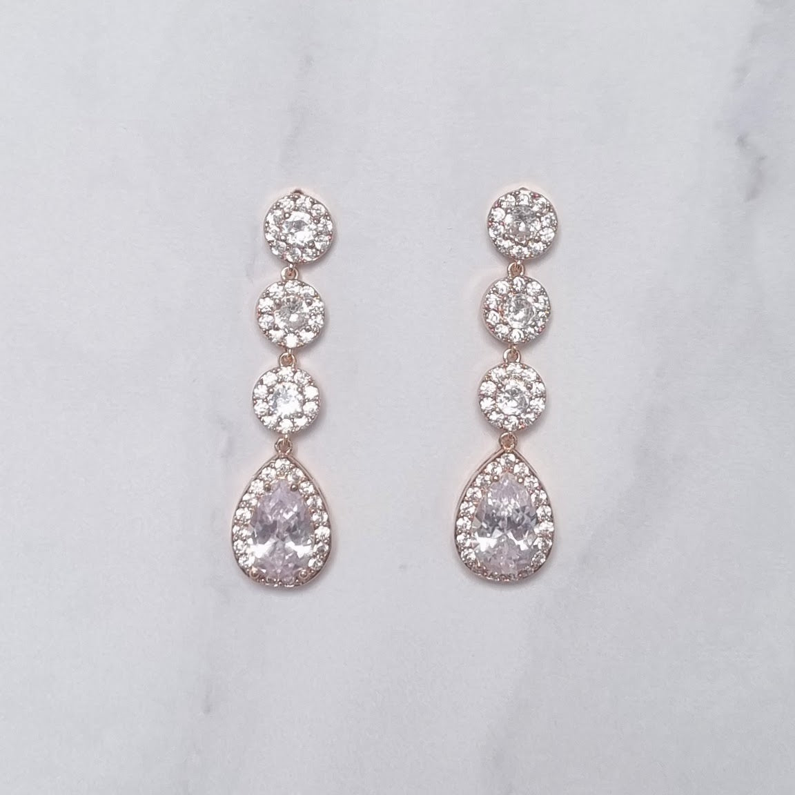 AR330 ARETES ROSA 3 CIRC Y GOTA