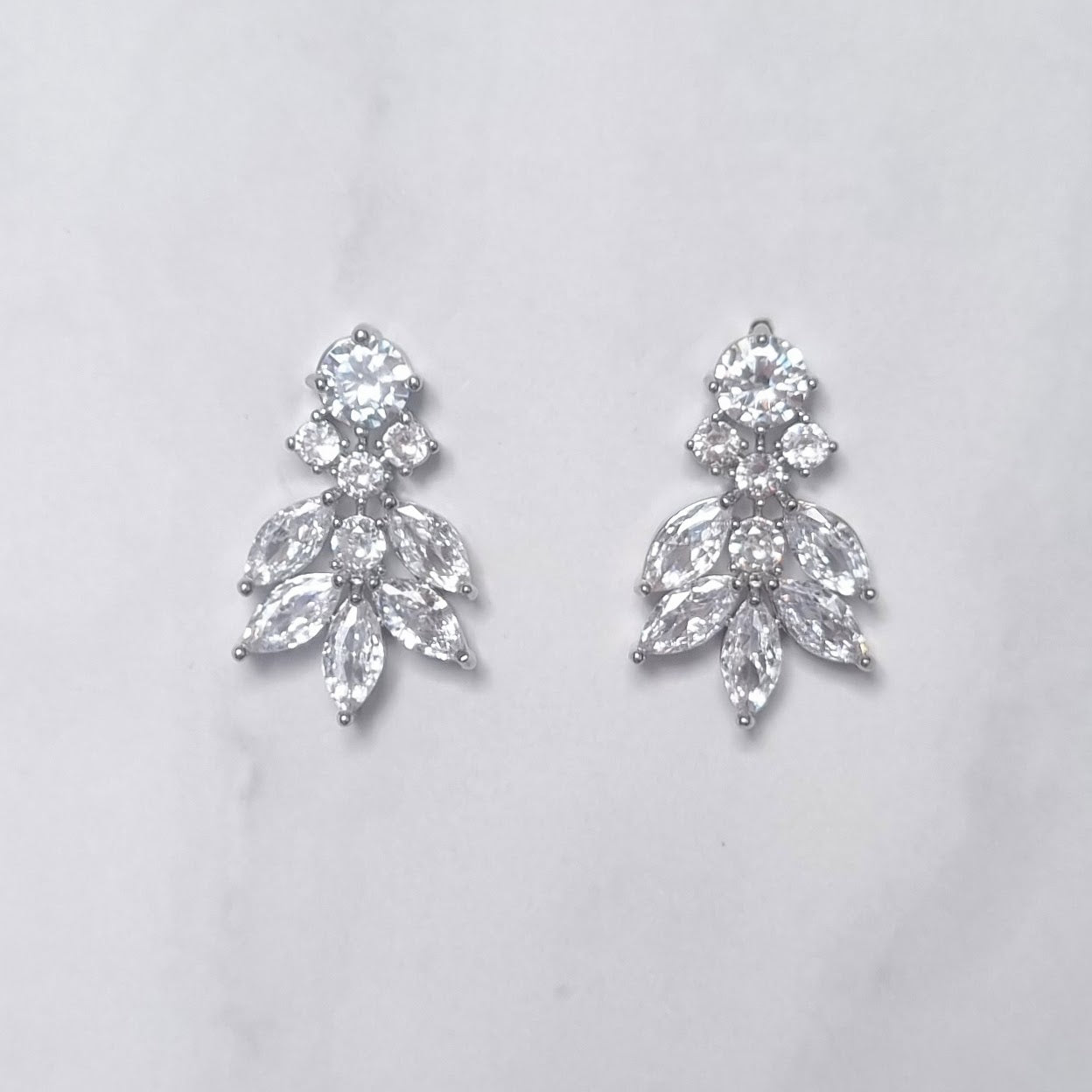 AP721 ARETES PLATA GOTA CIRC Y MARQ