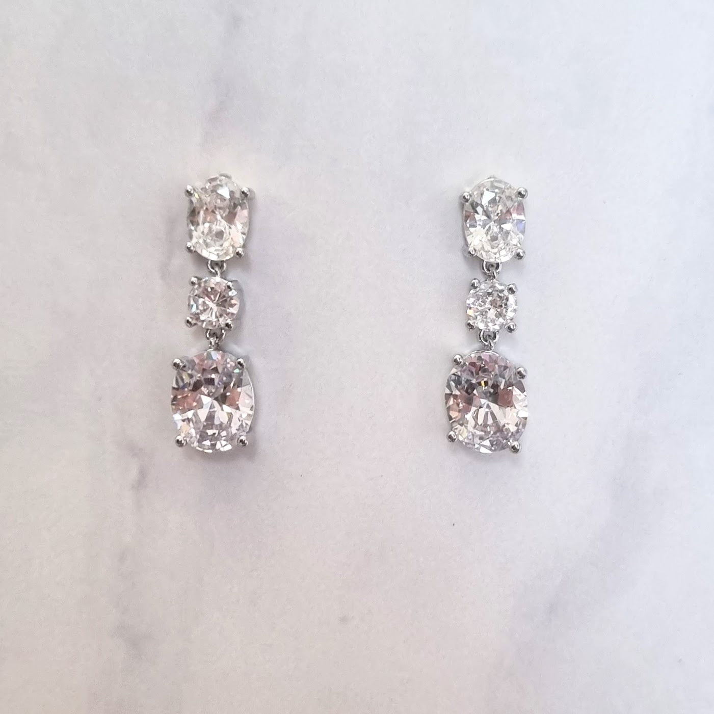 AP193 ARETES PLATEADOS 2 OVALOS CIRC