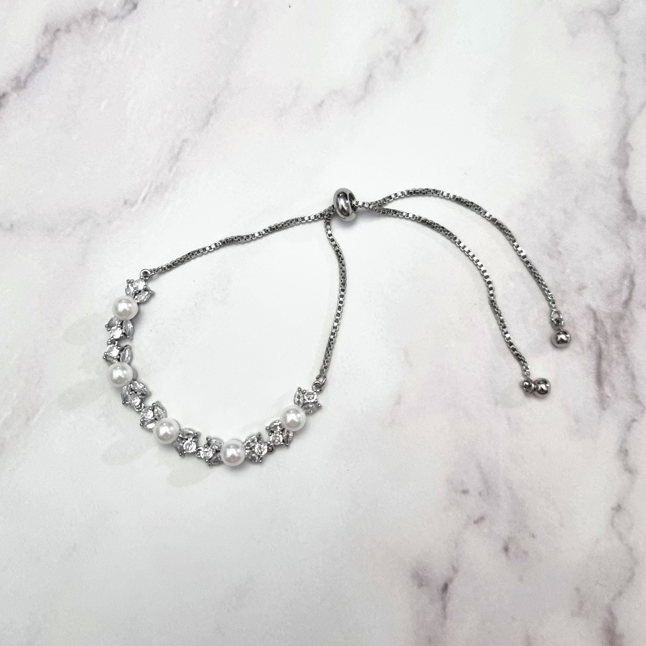 PP223 Pulsera Plateada Marq con Perlas