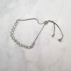 PP819 PULSERA PLATEADA AJUST CIRC MINI