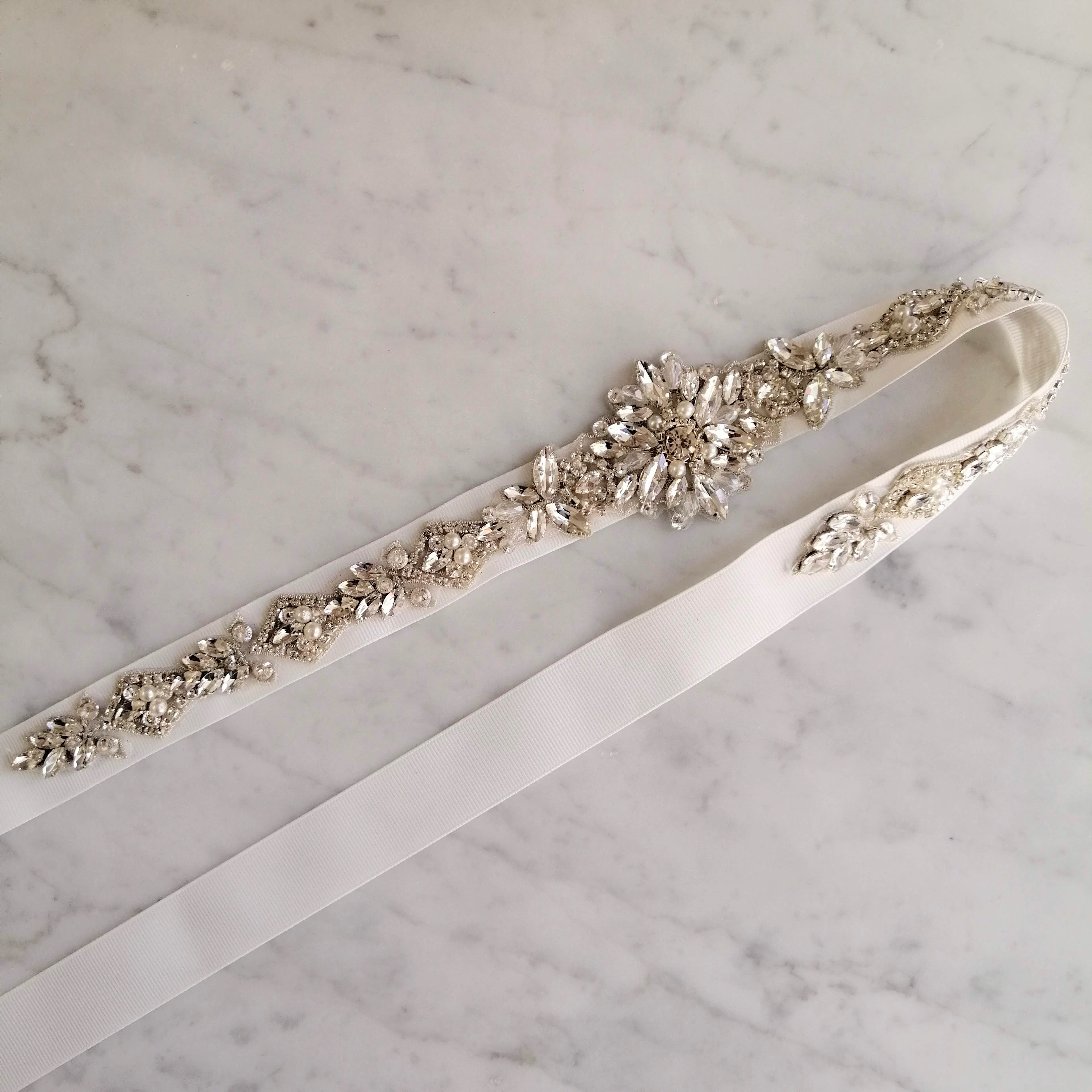 CPI344 CINTO PLATA BLANCO ROMBO CRIST Y LENT