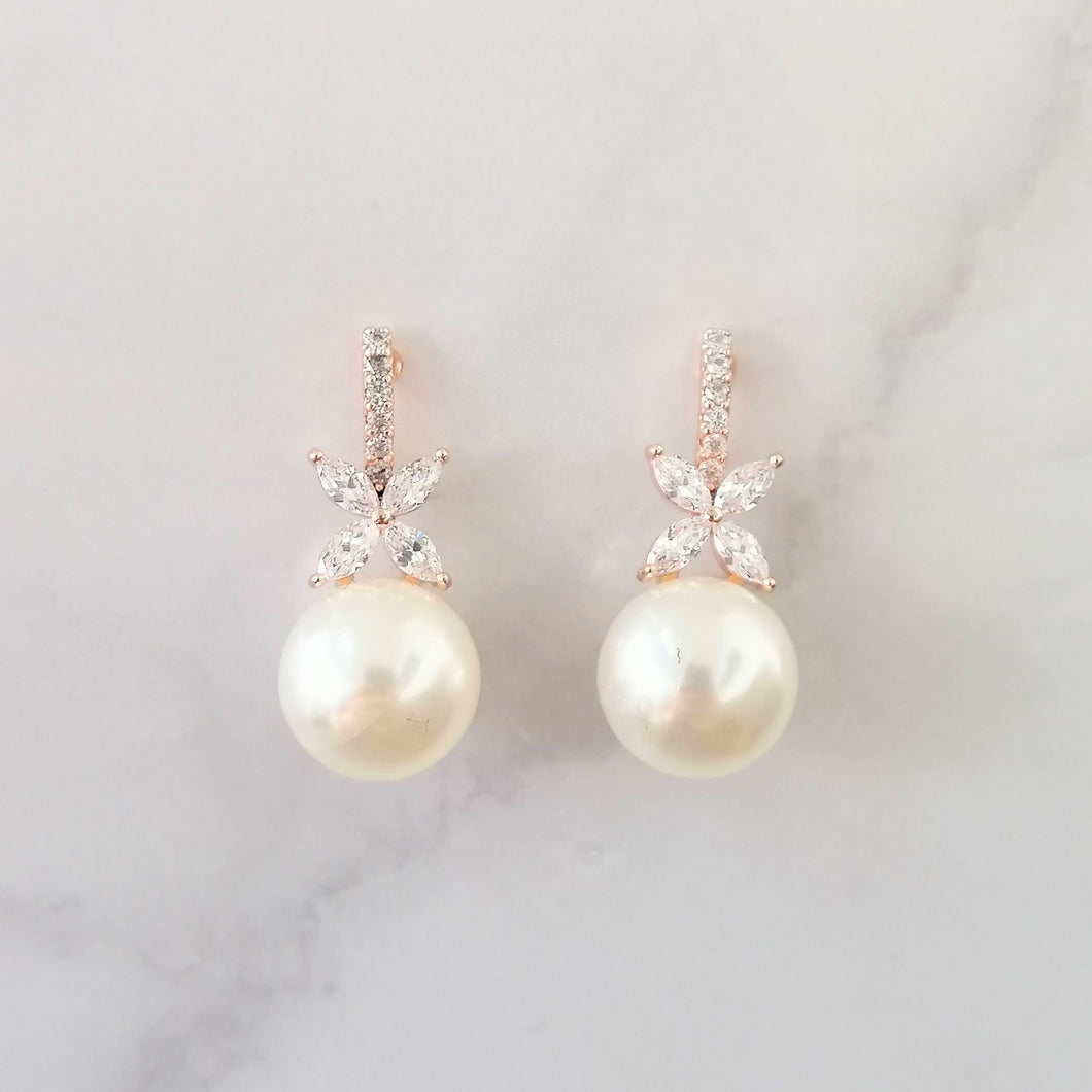 AR914 ARETES ROSAS PERLA CRUZ Y PAL