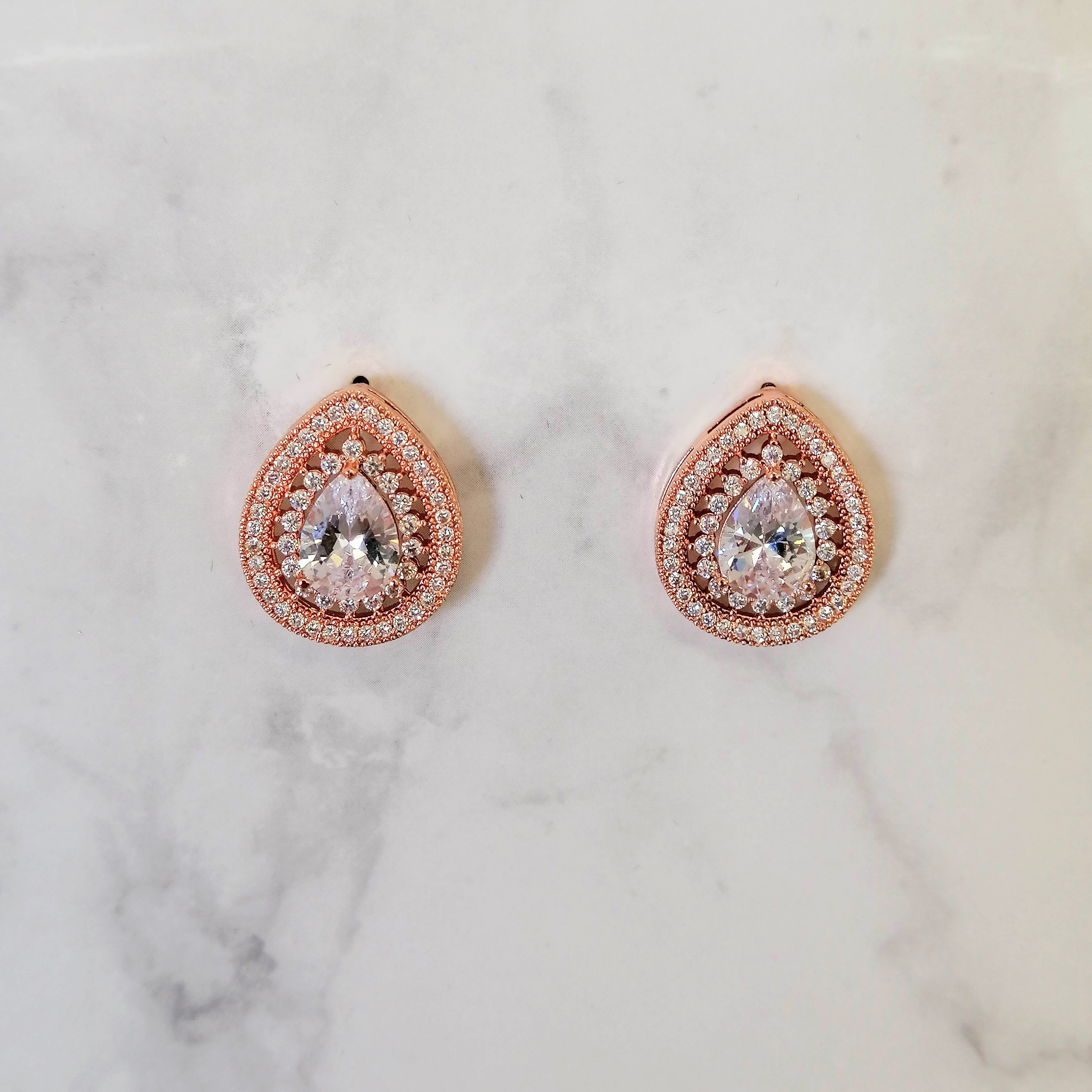 AR809 Aretes Oro Rosa Gota con Marco Doble