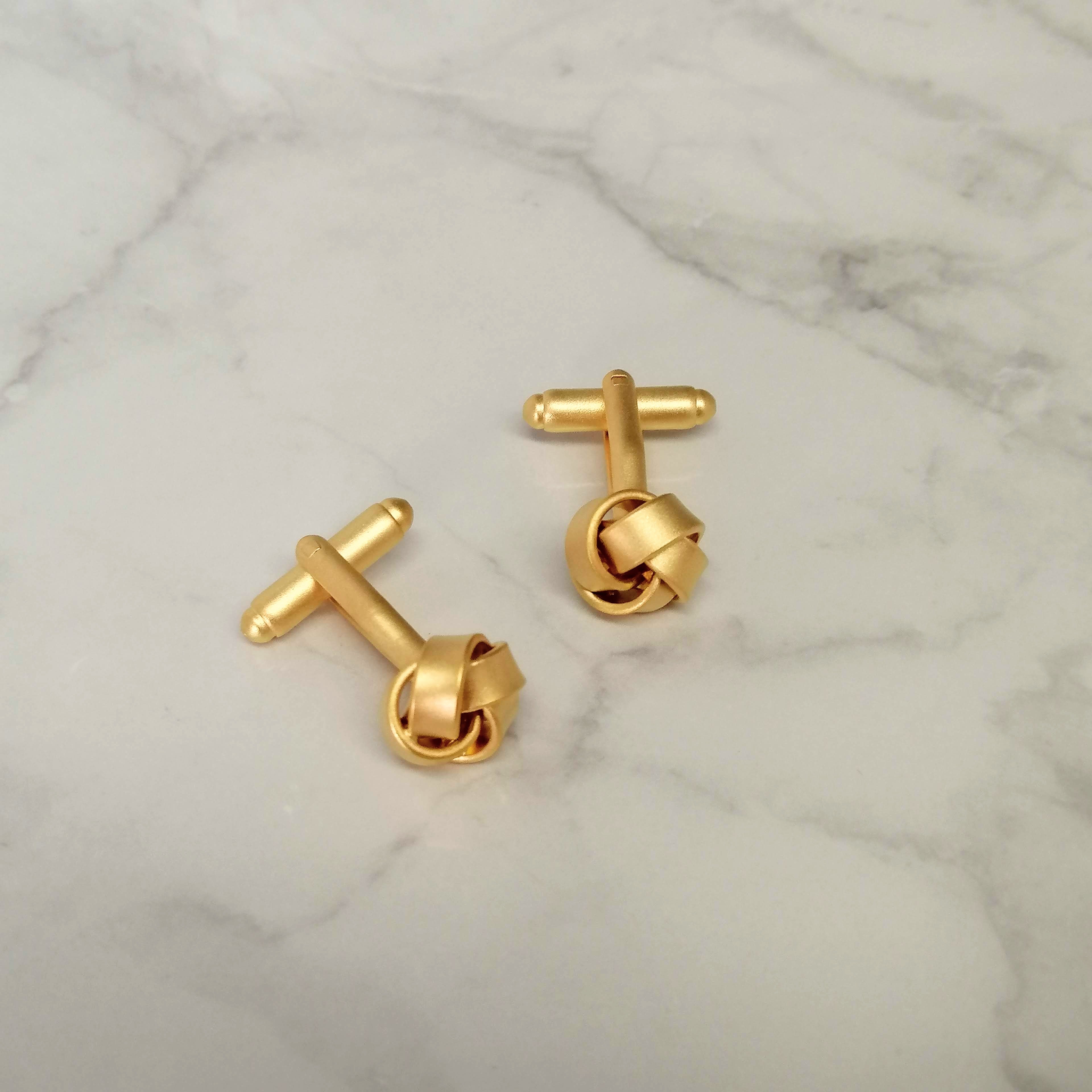 Mancuernillas Nudo Doradas