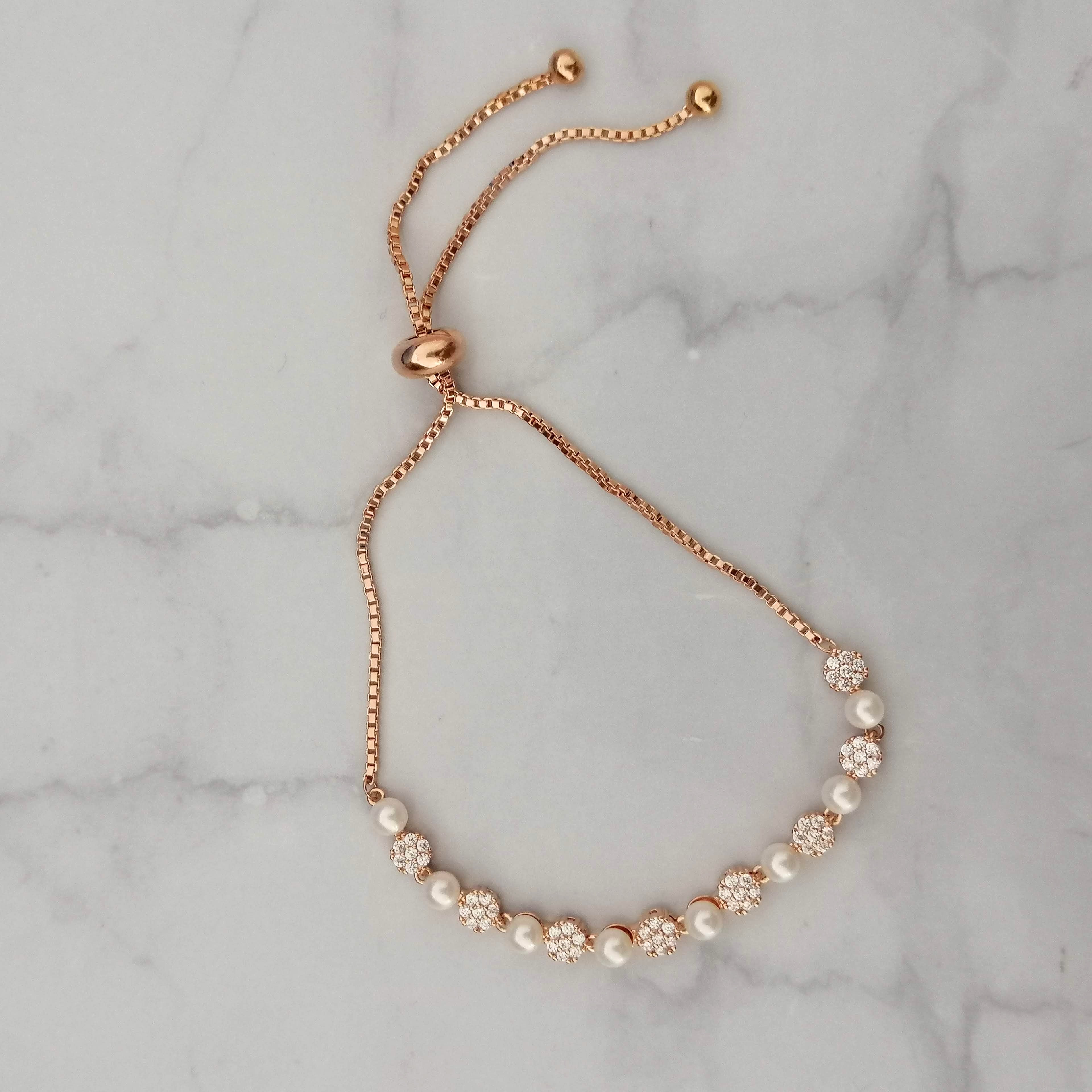 PR674 PULSERA ROSA AJUST CIRC CON PERLA MINI