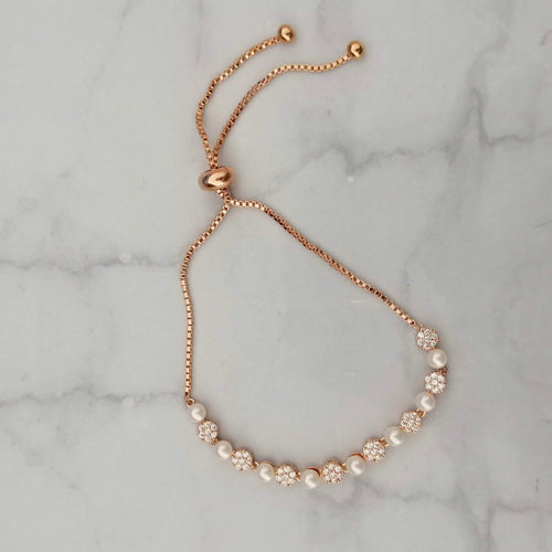PR674 PULSERA ROSA AJUST CIRC CON PERLA MINI