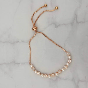 PR674 PULSERA ROSA AJUST CIRC CON PERLA MINI