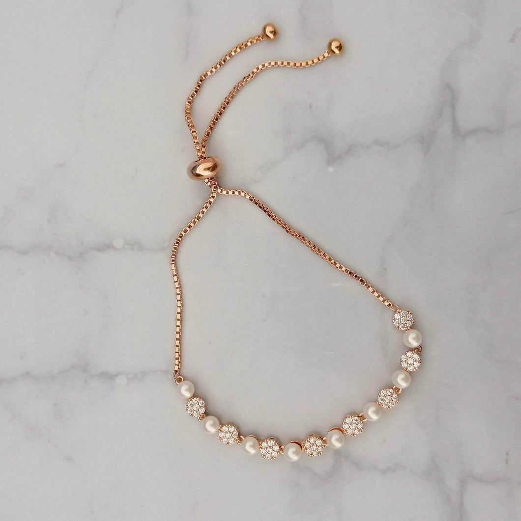 PR674 PULSERA ROSA AJUST CIRC CON PERLA MINI