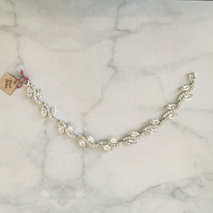 PP280 PULSERA PLATA CON CURVA Y HOJAS