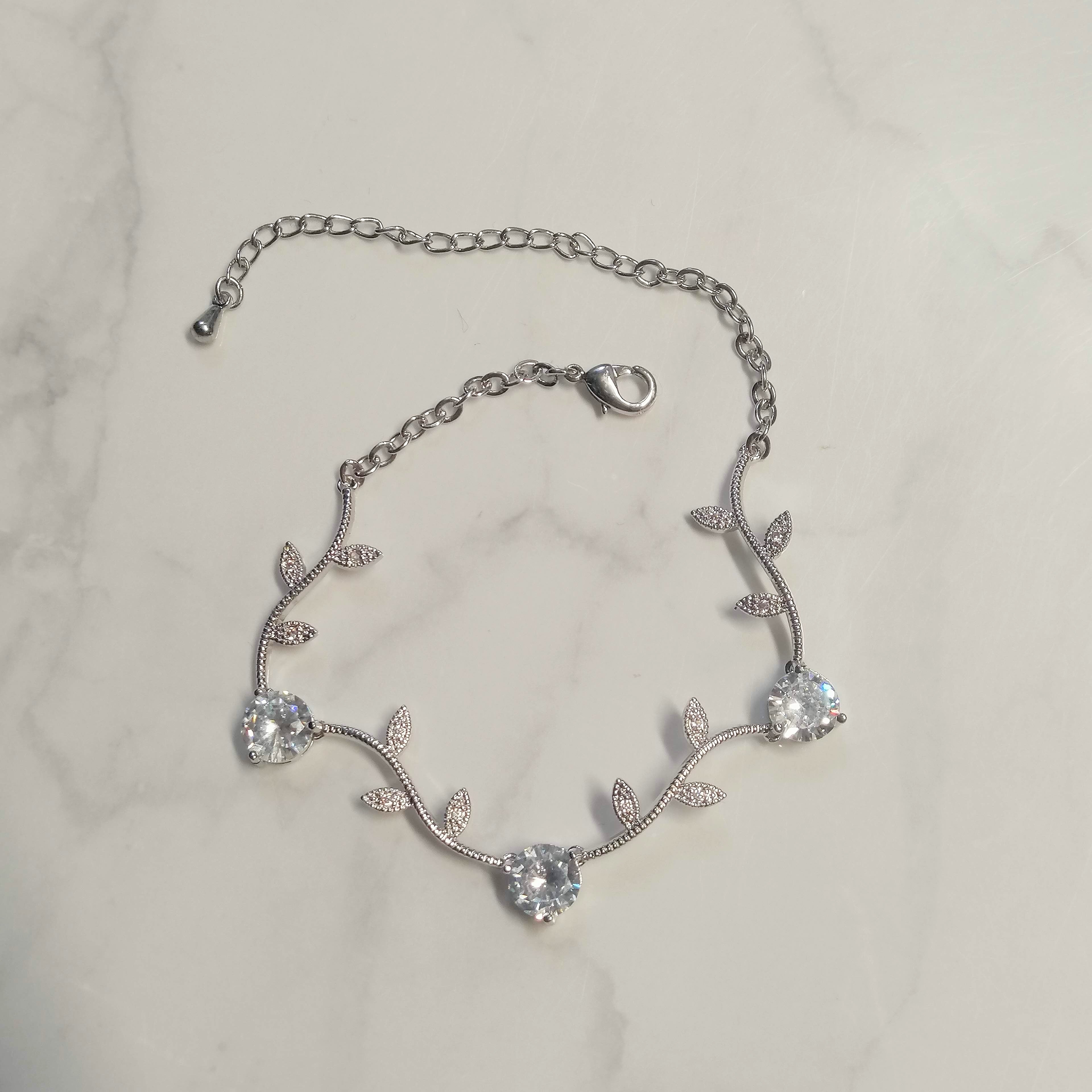PP562 PULSERA PLATA AJUST CADENA RAMITAS