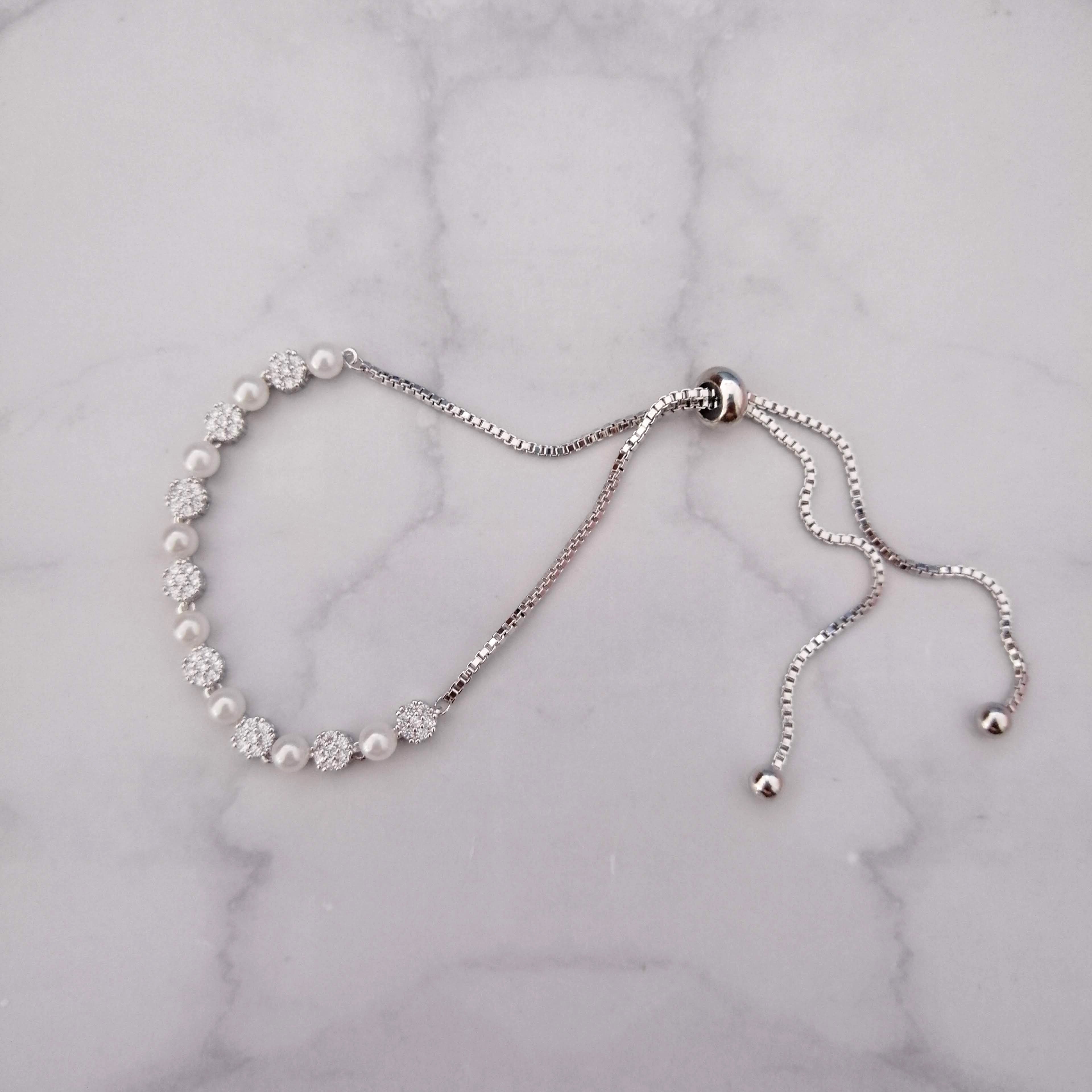 PP673 PULSER PLATA AJUST CRIRC Y PERLA MINI