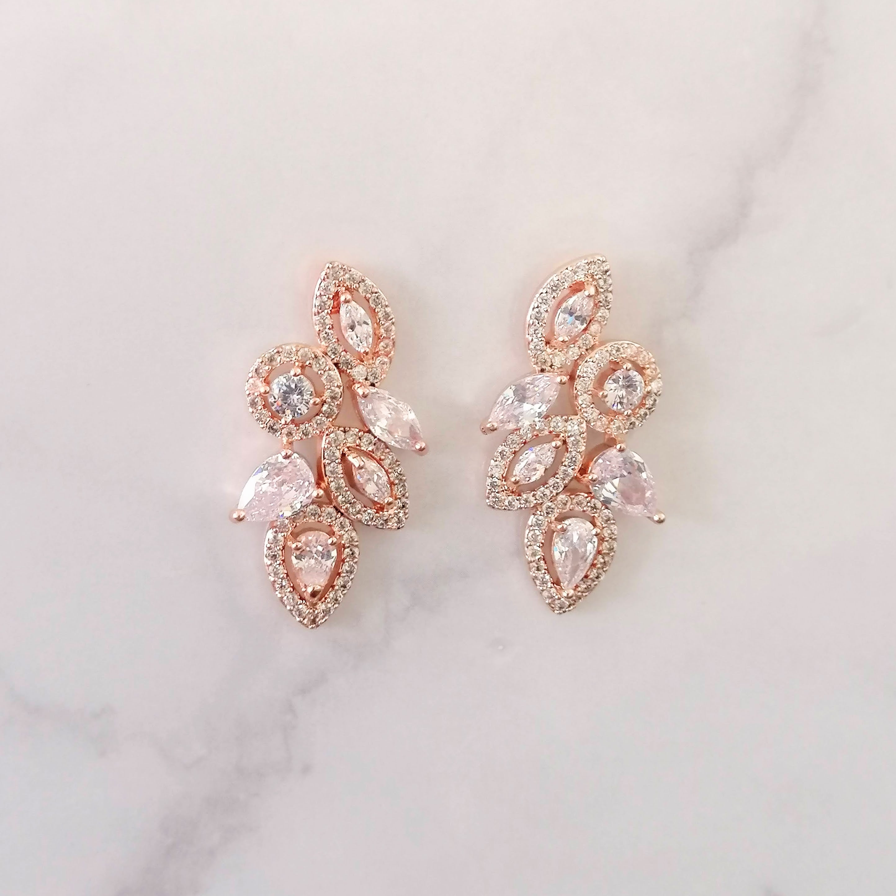 AR915 ARETES ROSAS STUD CON MARCO GOT Y CIRC
