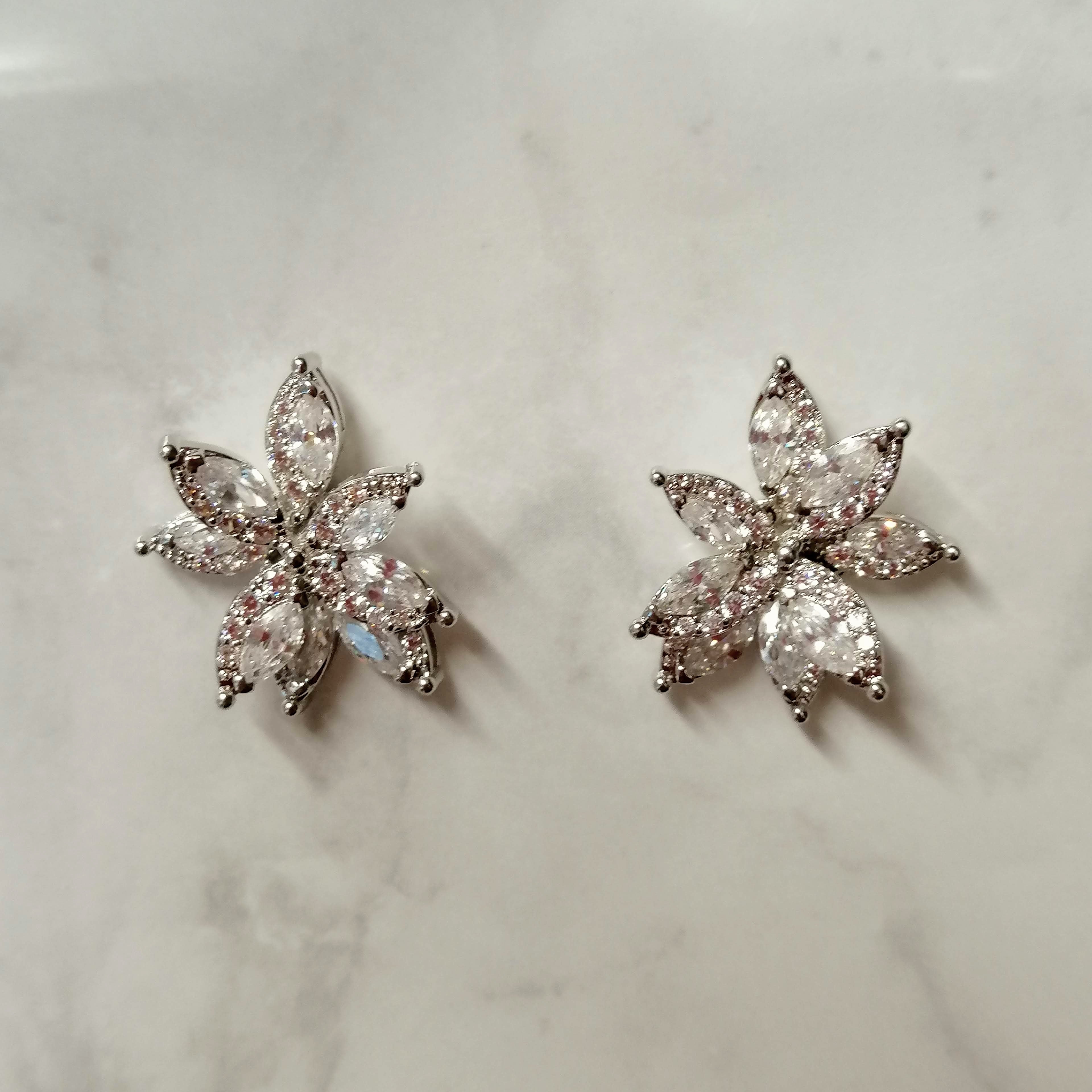 AP714 ARETES PLATA FLOR/ESTRELLA 3D