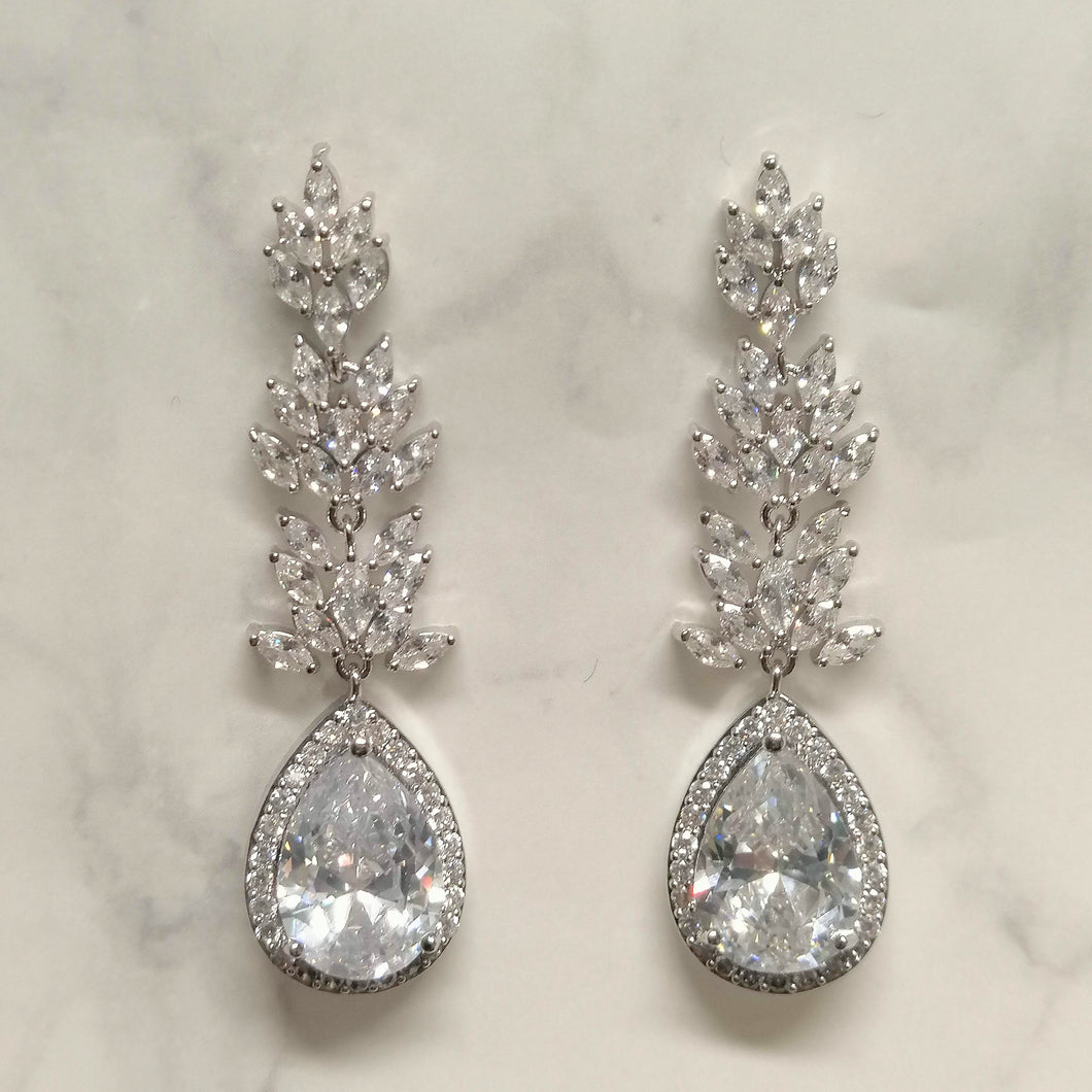 AP549 ARETES PLATA LARGOS MARQ