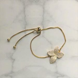 PD497 PULSERA ORO AJUST ORO FLOR FORR