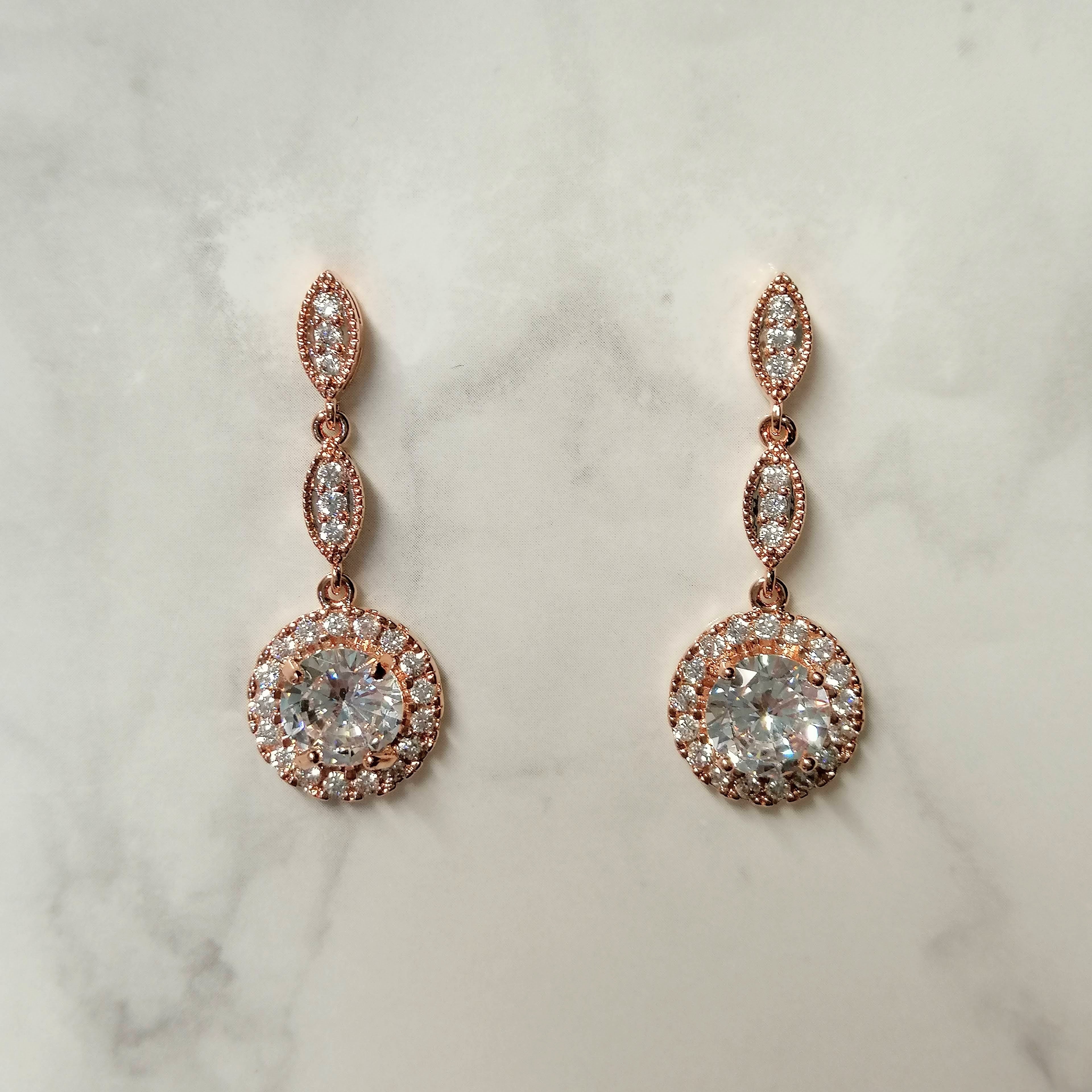 AR711 ARETES ROSA CIRC C MARCO Y DOS MARQ