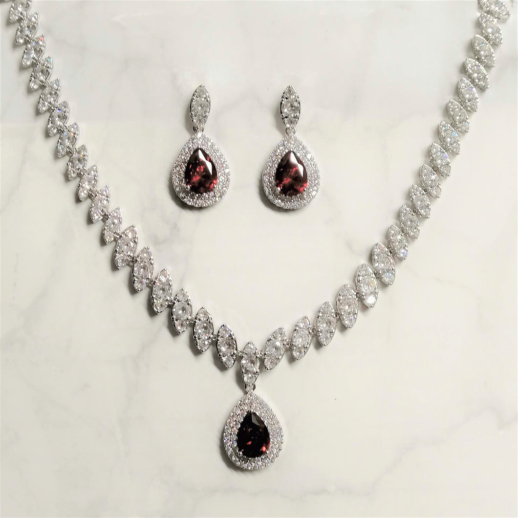 SP625 JUEGO PLATA CON GOTA ROJA