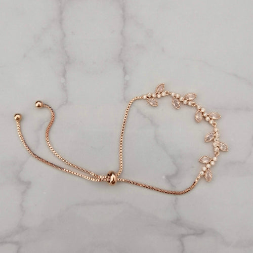 PR687 PULSERA ORO ROSA AJUST RAMITAS PLANA