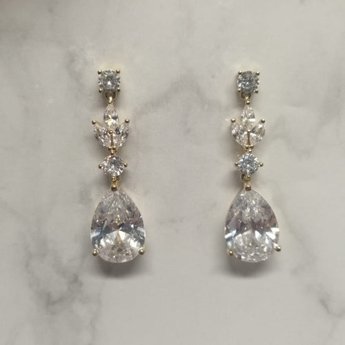AD424 ARETES DORADOS CIRC MARQ Y GOTA
