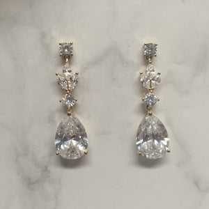 AD424 ARETES DORADOS CIRC MARQ Y GOTA