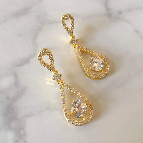 AD430 ARETES DORADOS GOTA HUECA