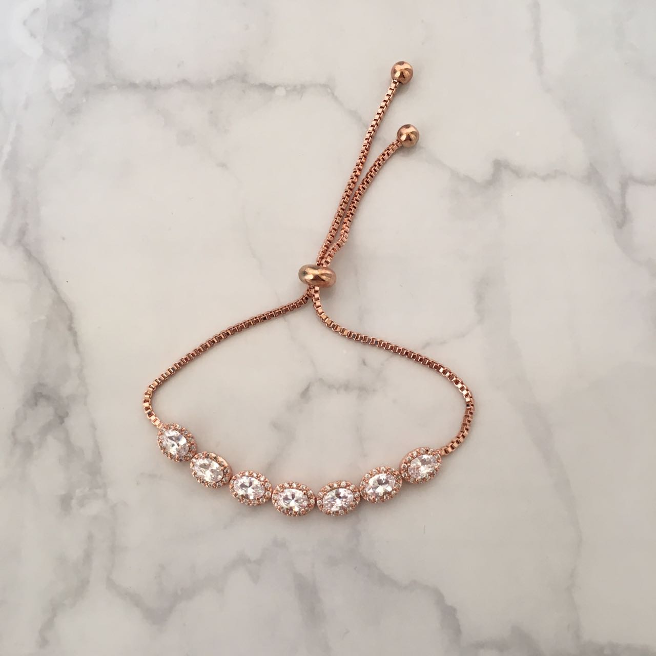 PR233 PULSERA ROSA AJUST OVALO