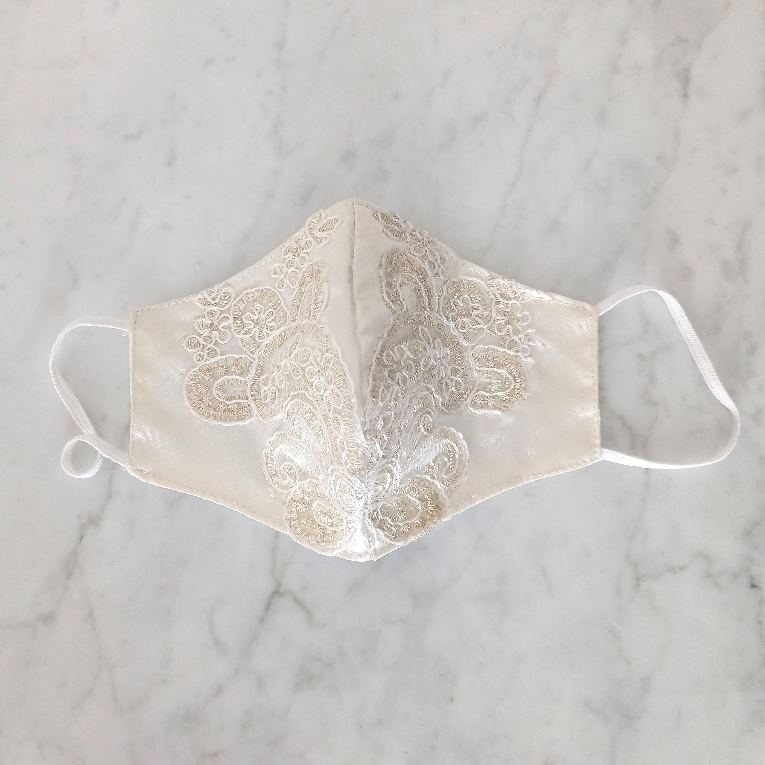 CB102 Cubrebocas color Ivory con Champagne