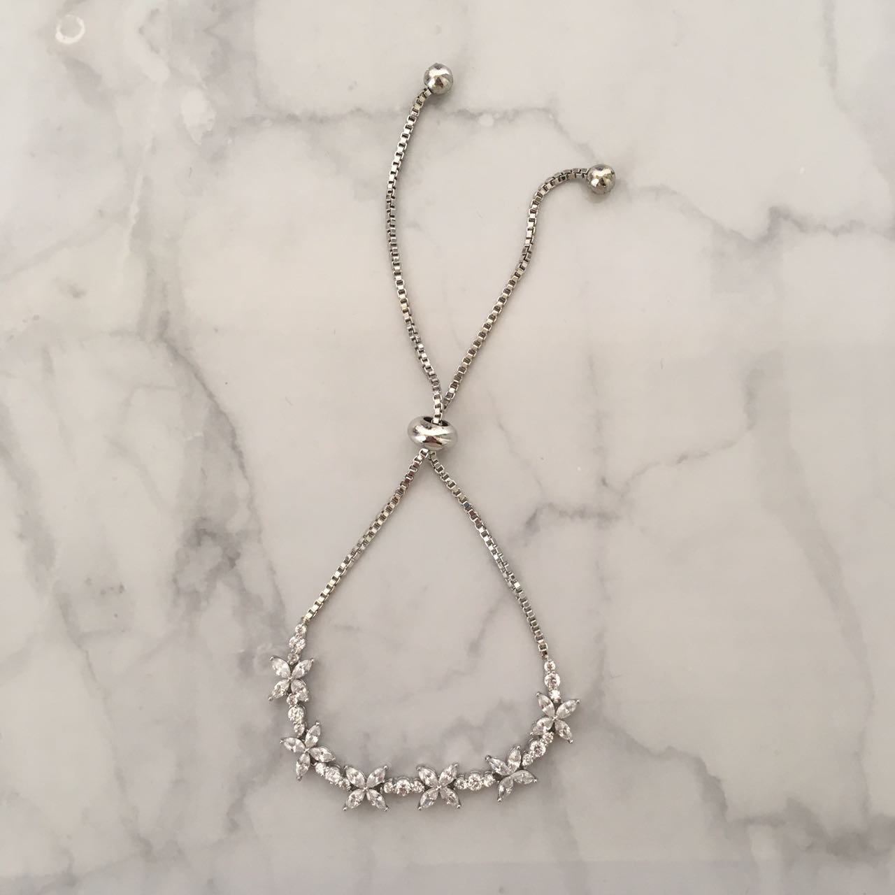 PP232 PULSERA PLATA AJUST FLOR MINI