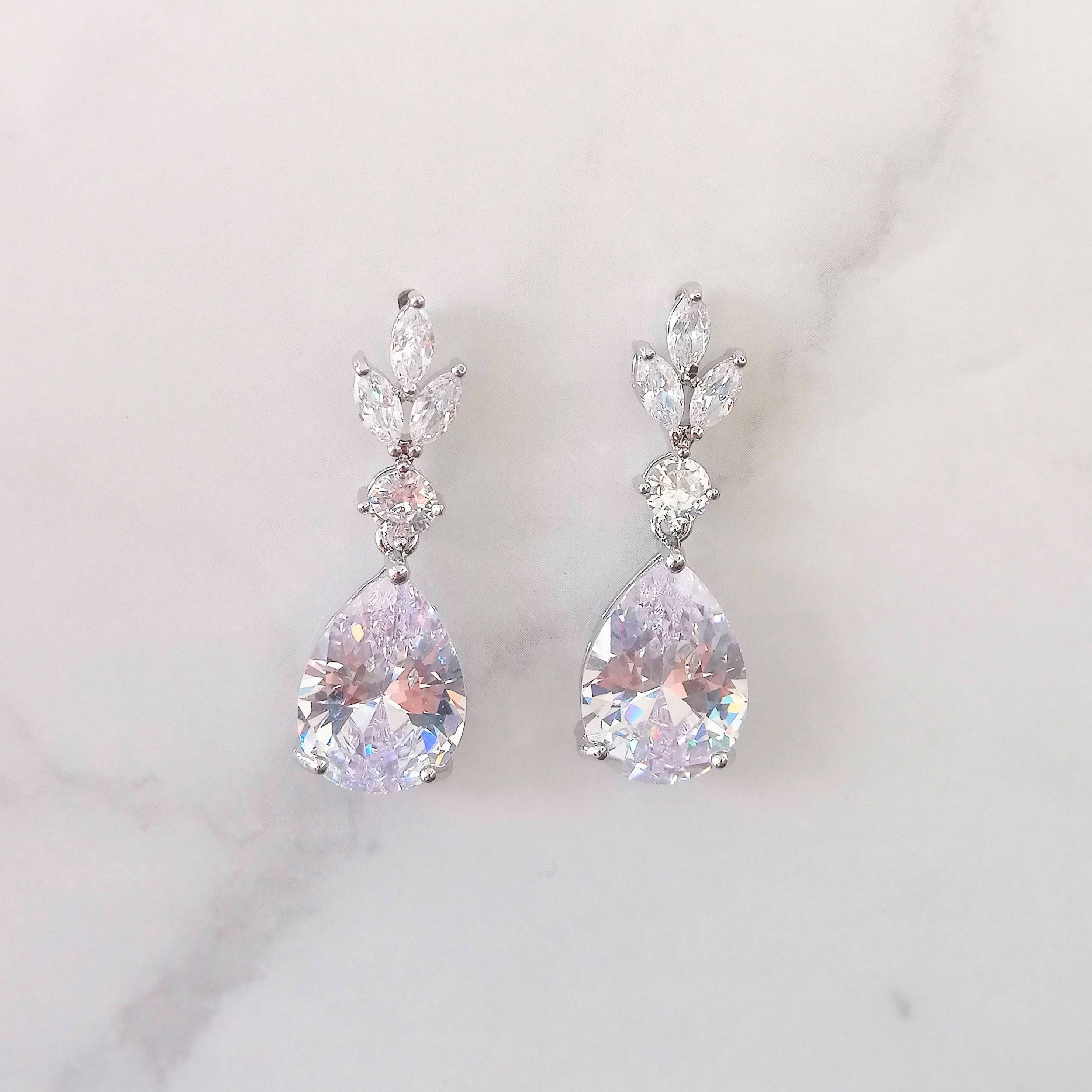 AP921 ARETES PLATEADOS MARQ CIRC Y GOTA