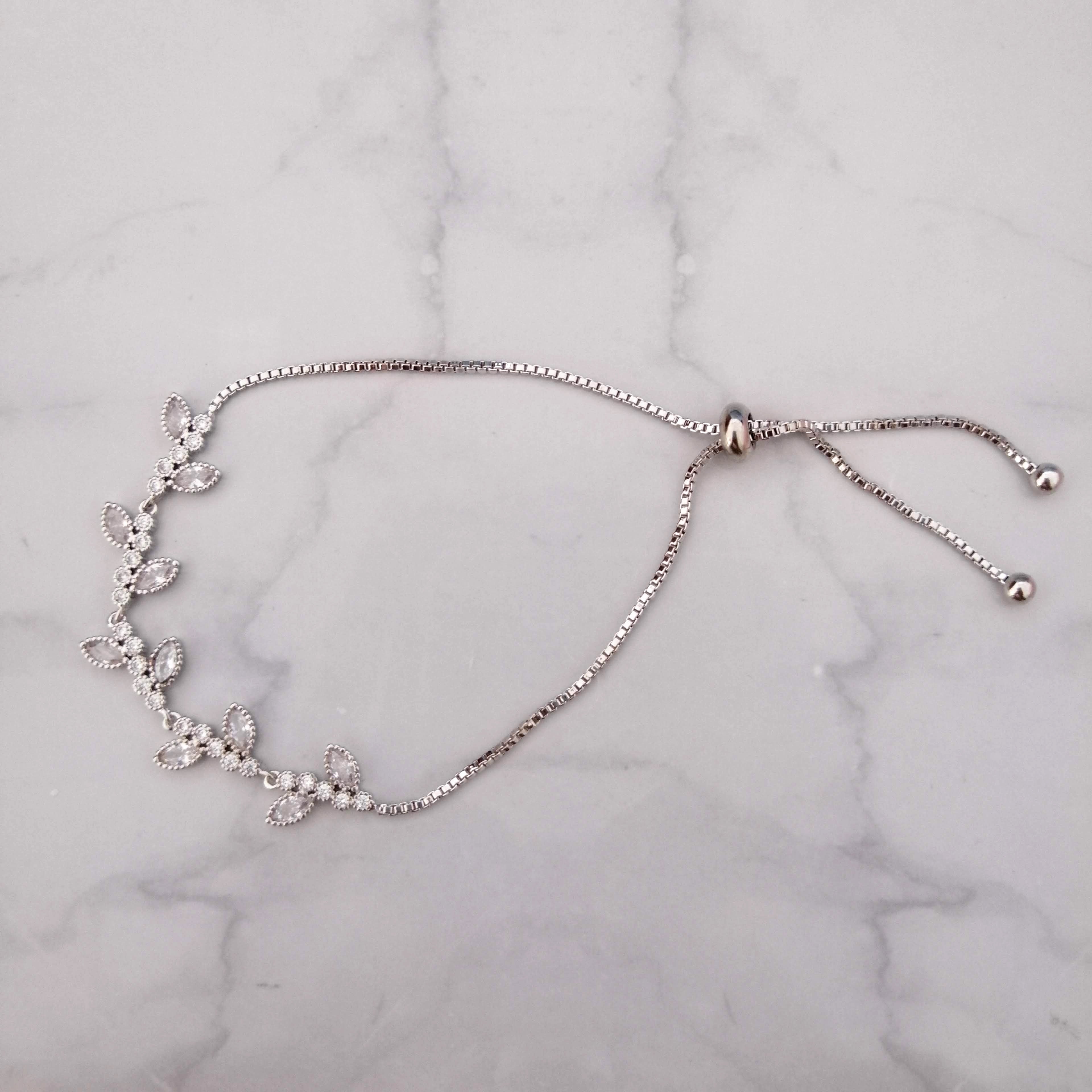 PP686 PULSERA PLATA AJUST RAMITAS PLANA