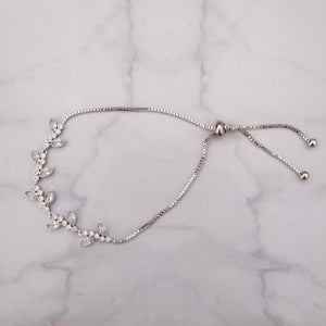 PP686 PULSERA PLATA AJUST RAMITAS PLANA