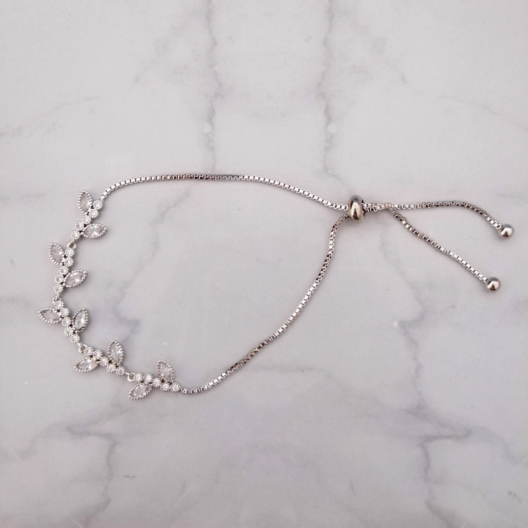 PP686 PULSERA PLATA AJUST RAMITAS PLANA