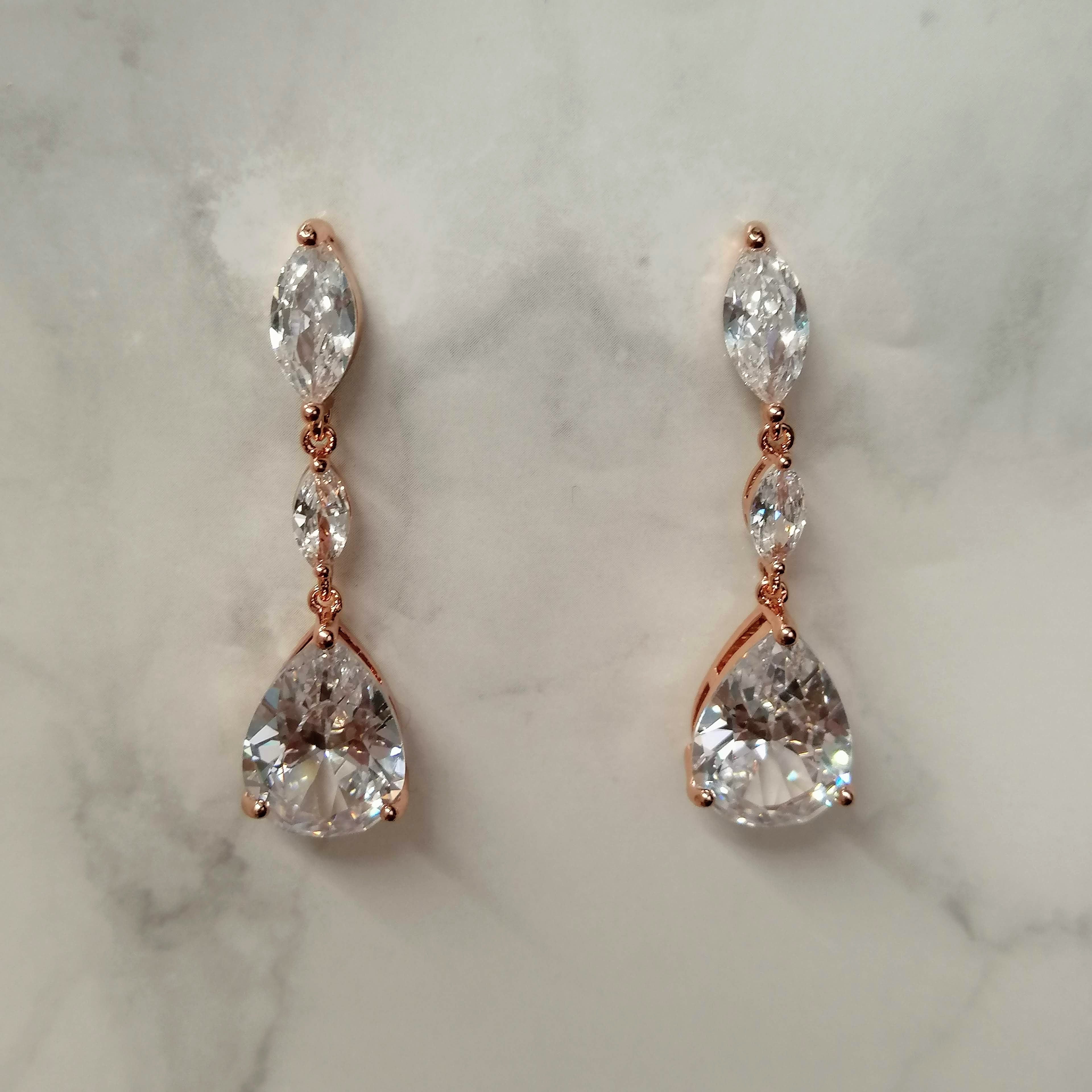 AR665 ARETES ROSA GOTA SOBRE 2 MARQ