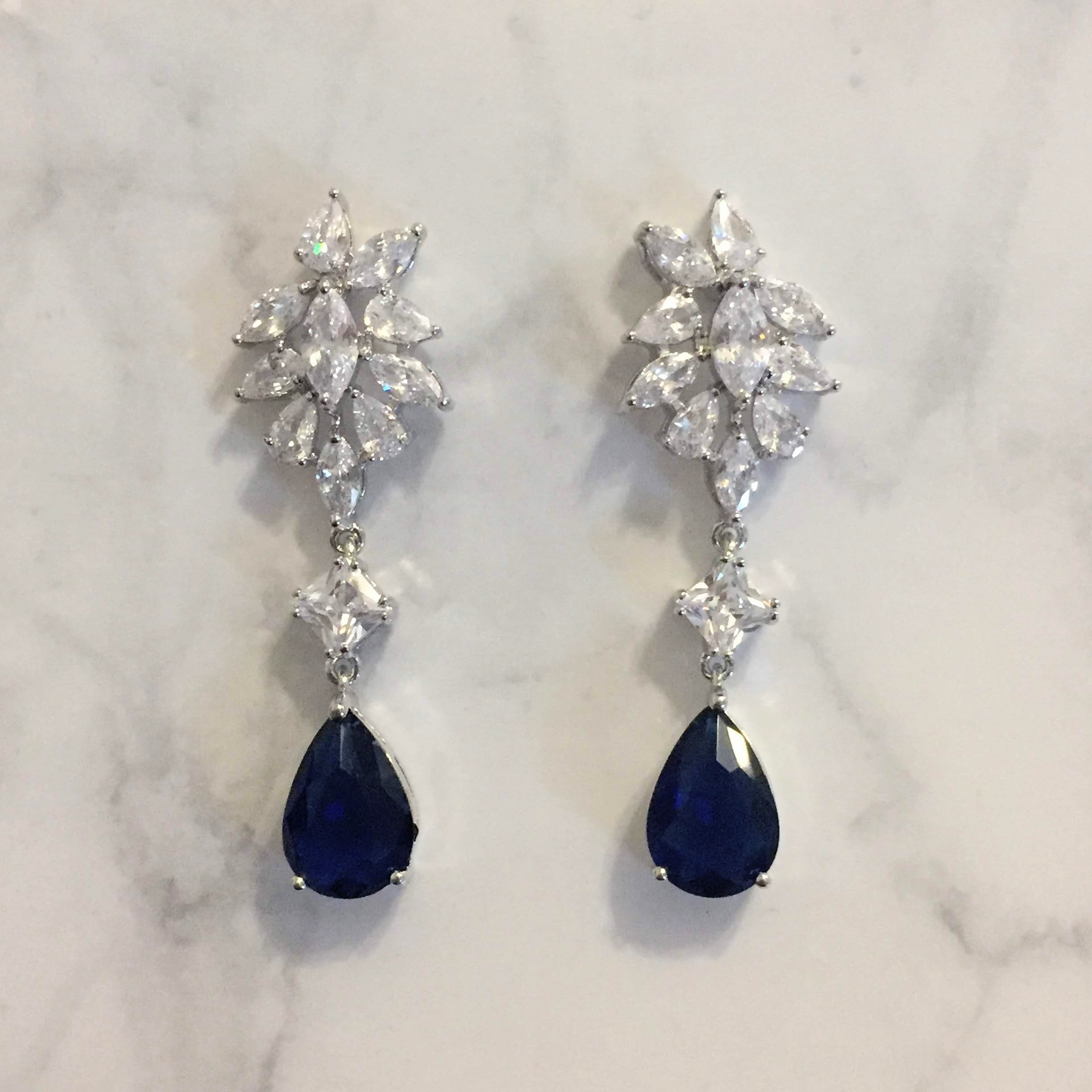 AP187 ARETES PLATA STUD MARQ CNK Y GOTA AZUL