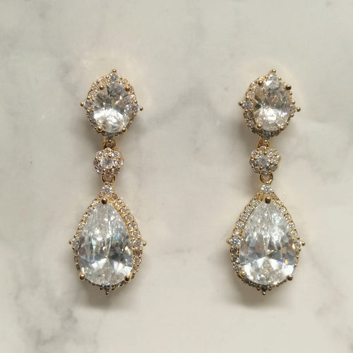 AD428 ARETES DORADOS OVALO-GOTA